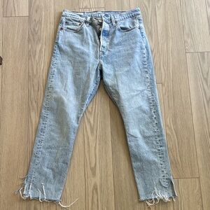 Levi’s 501 light wash frayed ankle jeans